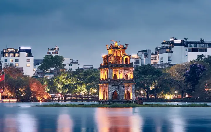 Turtle Tower on Hoan Kiem Lake in Hanoi at dusk
